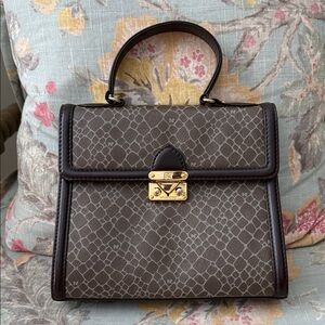 Nina Ricci Marquinerie Top Handle Bag   in a Signature Monogram Canvas